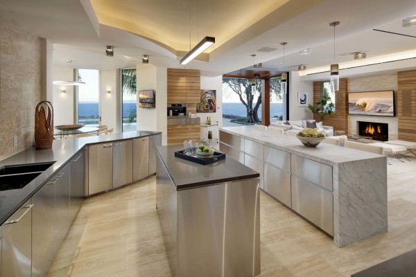 the-kitchen-is-filled-with-stainless-steel-appliances