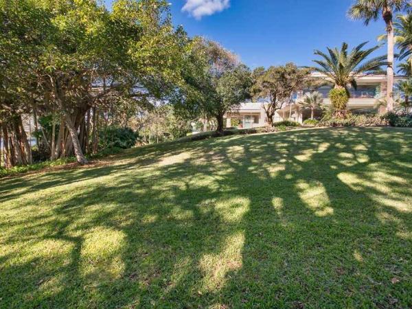 the-listing-touts-the-islands-unspoiled-natural-beauty-and-putting-green-and-par-three-hole-theres-even-a-garage-for-malones-golf-cart