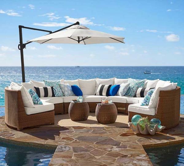 Pottery-Barn-honey-wicker-sectional-next-to-ocean