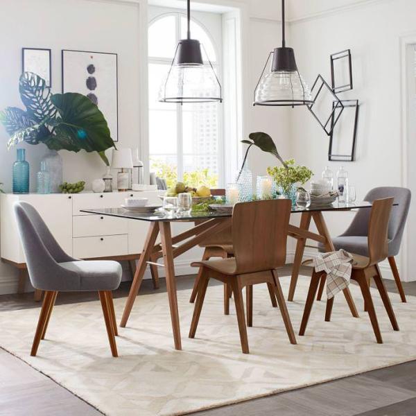Large-tropical-leaves-in-a-modern-dining-room