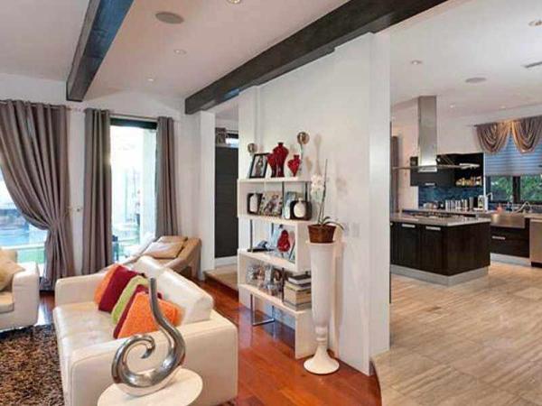 sure-the-decor-is-a-bit-dated-but-the-floor-plan-is-nice-and-open-with-lots-of-high-ceilings-and-natural-light