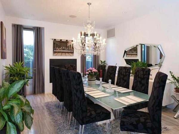 the-dining-room-is-best-imagined-with-different-chairs-and-less-fake-foliage