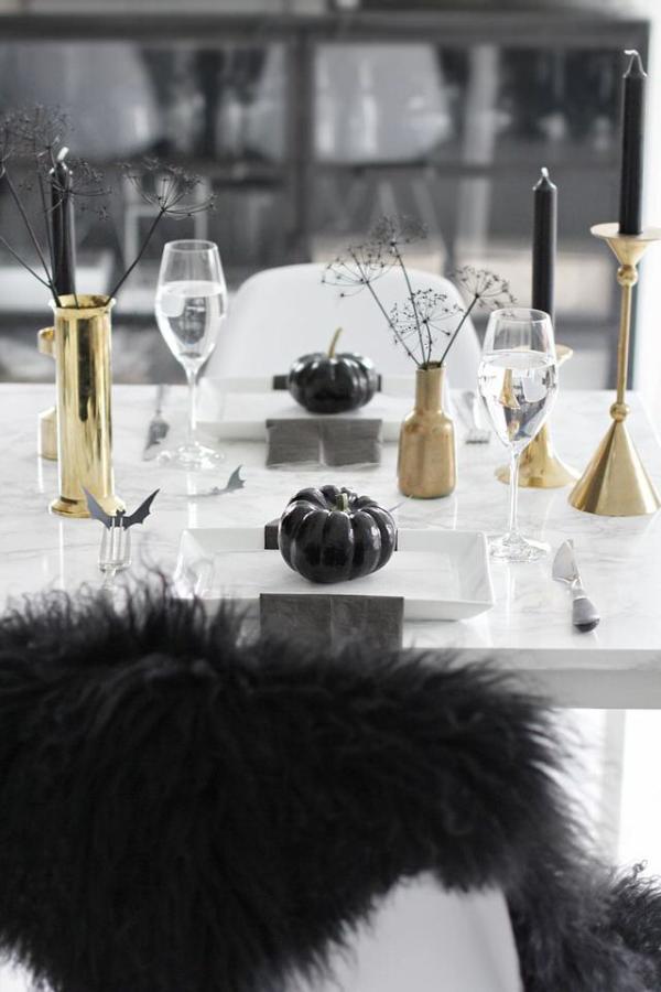 A-less-scary-Halloween-table-setting-in-black-and-gold