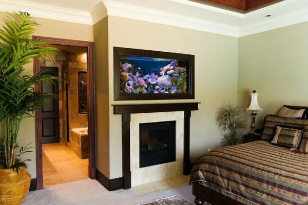 Aquarium-above-fireplace-in-bedroom