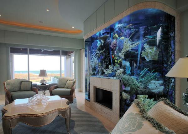 Aquarium-surrounding-fireplace-in-living-room