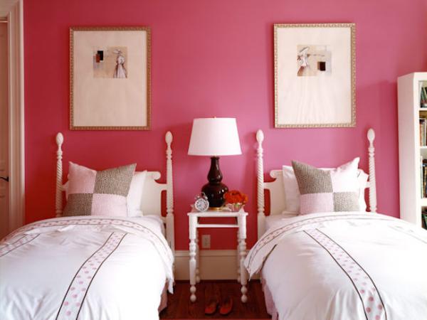 French-cane-beds-against-a-boldly-painted-wall