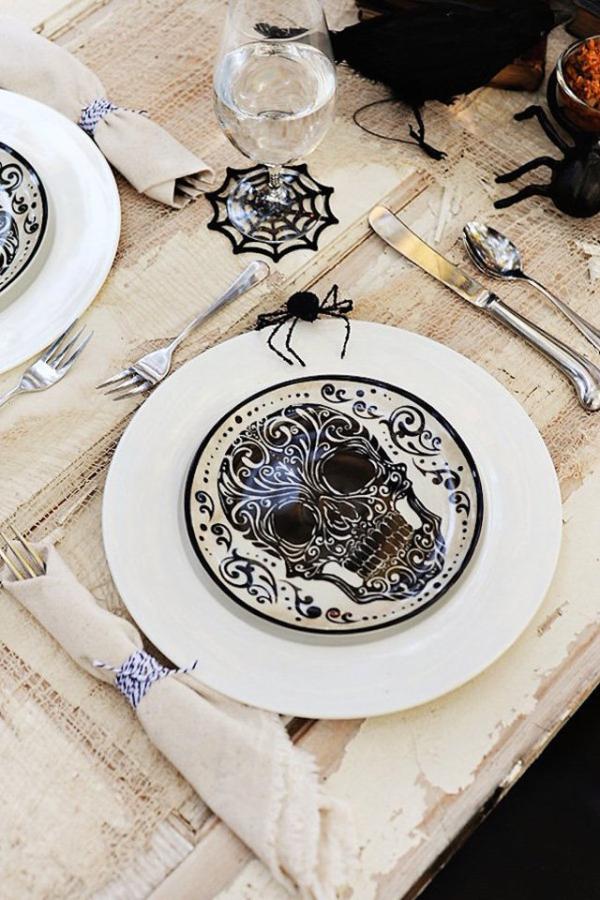 Halloween-themed-skull-plates-and-spiderweb-glasses