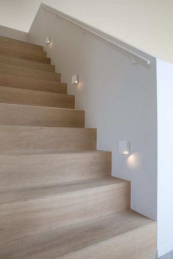 Staircase-light-fixtures-with-corners-removed-to-light-up-the-steps