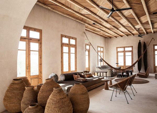 Stone-houses-at-the-Scorpios-in-Mykonos-with-unique-decor-and-a-60s-rustic-syle