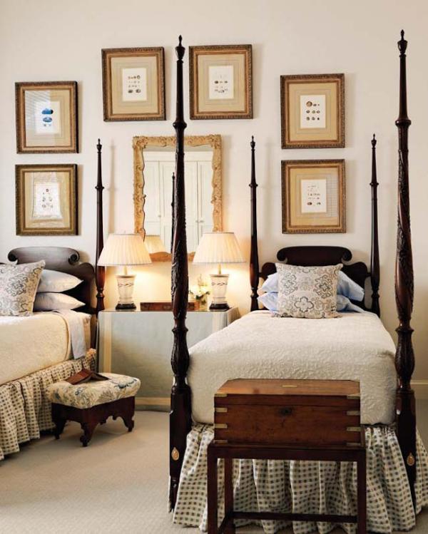 Stunning-four-post-twin-beds-complimented-by-wall-art