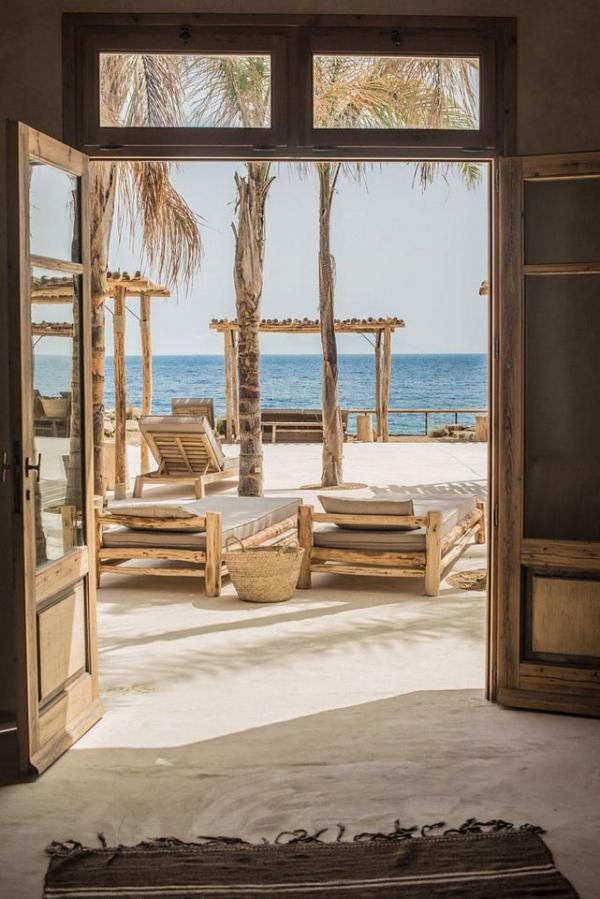 View-of-the-blue-sea-and-the-outdoor-retreats-from-the-villas