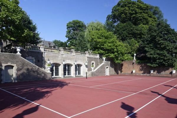 a-full-size-tennis-court-also-sits-on-the-property-though-it-appears-the-new-owner-will-have-to-supply-their-own-net