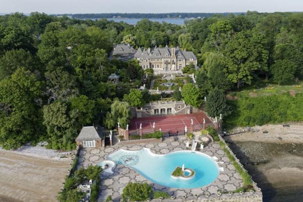 behind-the-main-house-through-the-garden-and-past-the-tennis-court-youll-find-another-pool-this-one-has-its-own-water-slide