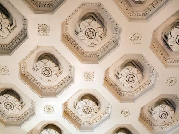 the-13-feet-high-parlor-ceilings-which-include-this-coffered-rosette-design-are-among-the-homes-historical-artifacts