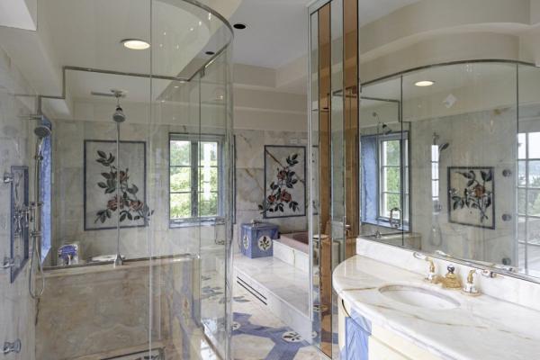 the-bathrooms-are-also-custom-with-lots-of-glass-and-marble