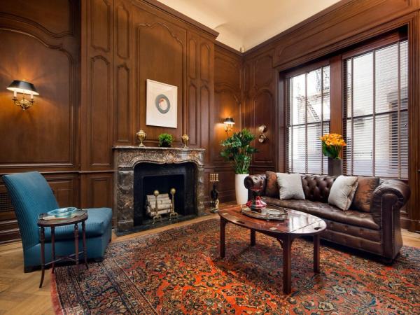 the-home-has-several-secret-passageways-one-links-the-library-to-a-hidden-card-room-while-another--obscured-by-a-coat-closet--leads-to-the-basement