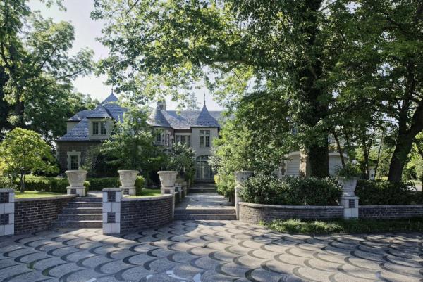 the-propertys-history-is-apparent-in-the-backyard-of-the-main-residence-where-old-growth-trees-have-stood-for-nearly-a-century
