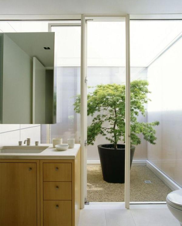 Bathroom-with-walkout-to-a-bright-courtyard