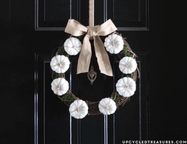 Decorate-a-grapevine-wreath-with-miniature-pumpkins