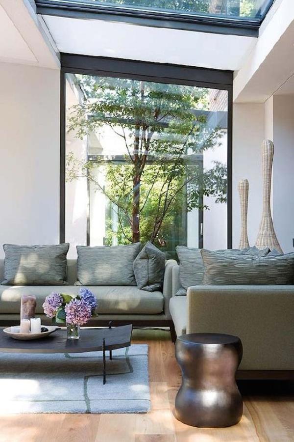 Living-room-that-looks-in-on-a-gorgeous-green-courtyard