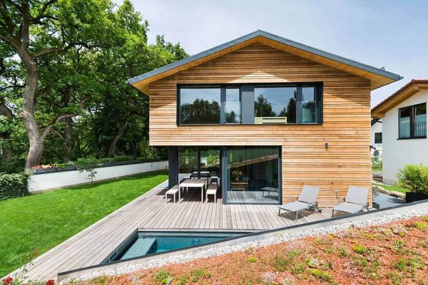 Relaxing-deck-and-pool-area-of-the-modern-house-in-Bavaria