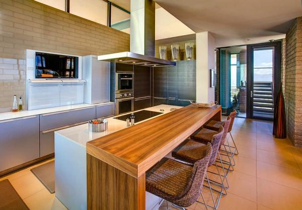 Ergonomic-modern-kitchen-design-with-central-island-and-breakfast-nook