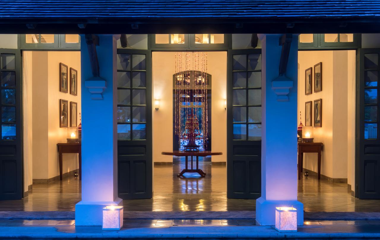 Entrance lobby of Amantaka luxury Resort & Hotel at blue hour in Luang Prabang Laos.jpg