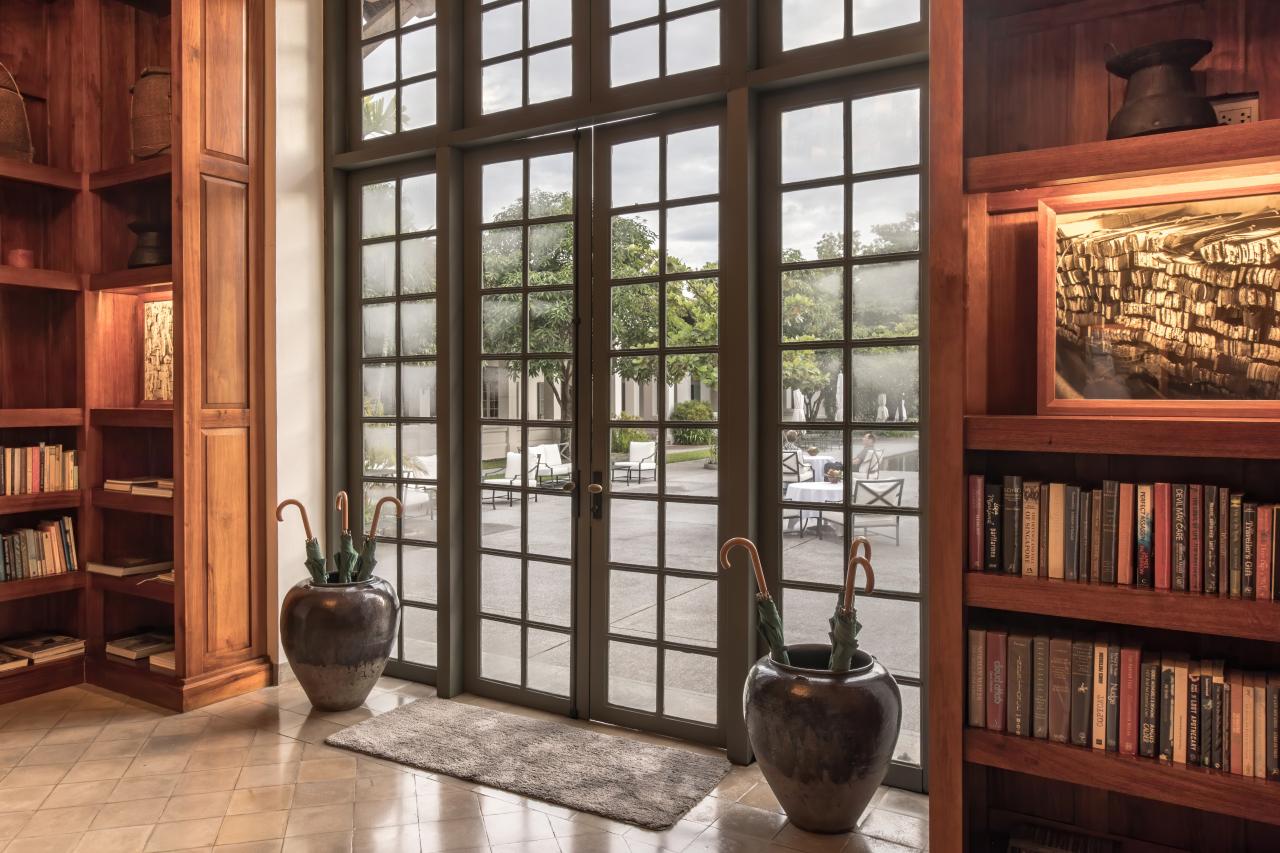 Glass door of the library at Amantaka luxury Resort & Hotel in Luang Prabang Laos.jpg