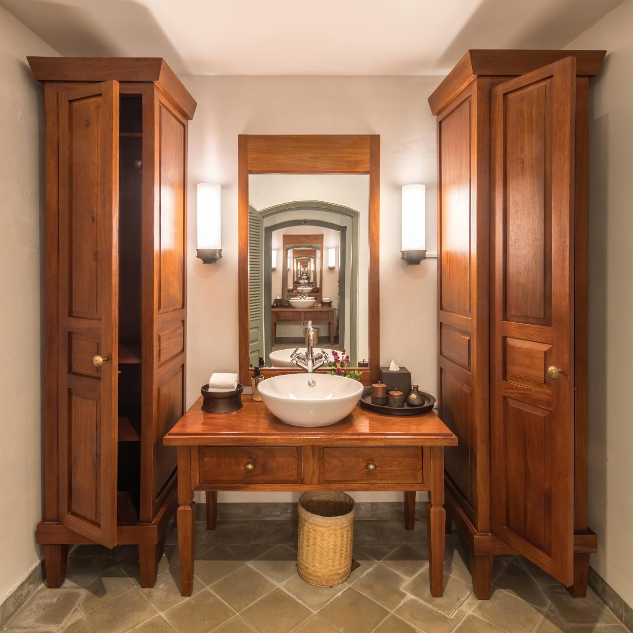 Infinity mirror, hand-washing sink and wardrobes in the spa of Amantaka luxury Resort & Hotel in Luang Prabang Laos.jpg