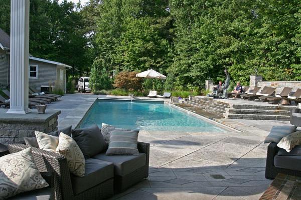 Expansive-pool-area-with-a-stamped-concrete-deck