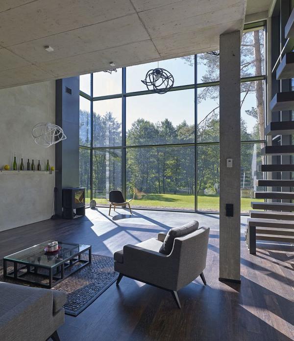 Exposed-concrete-and-glass-shape-the-spacious-living-area-with-minimal-overtones