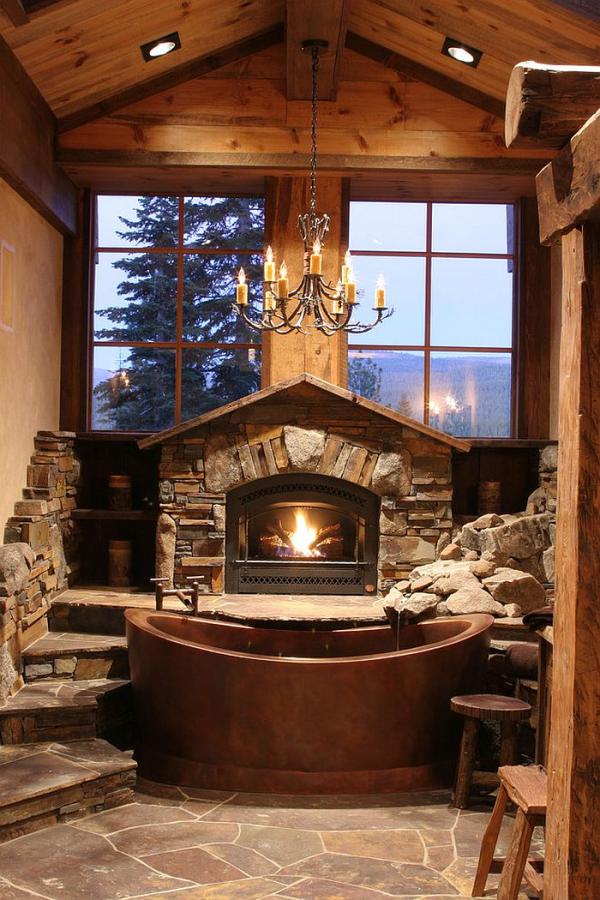 Fabulous-cabin-style-bathroom-with-copper-bathtub-fireplace-and-large-windows