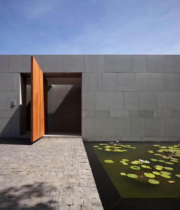 Fish-pond-on-the-interior-of-the-house-bordering-a-lovely-walkway