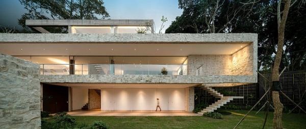 Front-facade-of-the-home-beautifully-lit-at-dusk