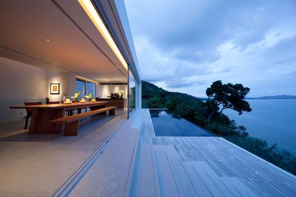 Gorgeous-outdoor-deck-with-infinity-pool-and-transparent-railing