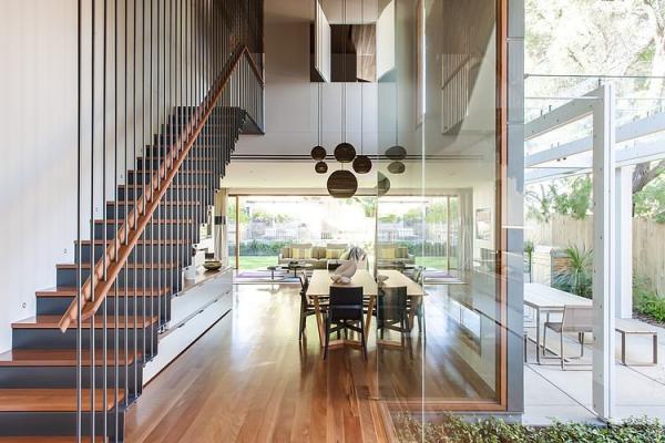 Interior-with-high-ceiling-and-wooden-flooring-looks-trendy-and-inviting