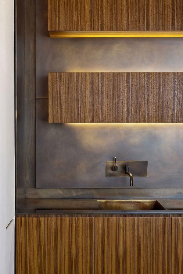 LED-strip-lighting-gives-the-floating-kitchen-cabinets-a-surreal-aura