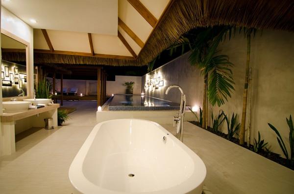 Luxurious-villas-of-the-Kuramathi-Island-Resort-after-sunset