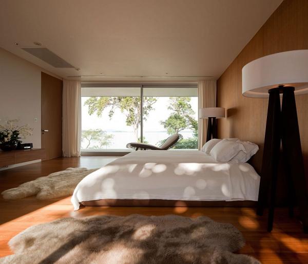 Oversized-lighting-and-plush-textures-shape-the-holiday-retreat-styled-bedroom