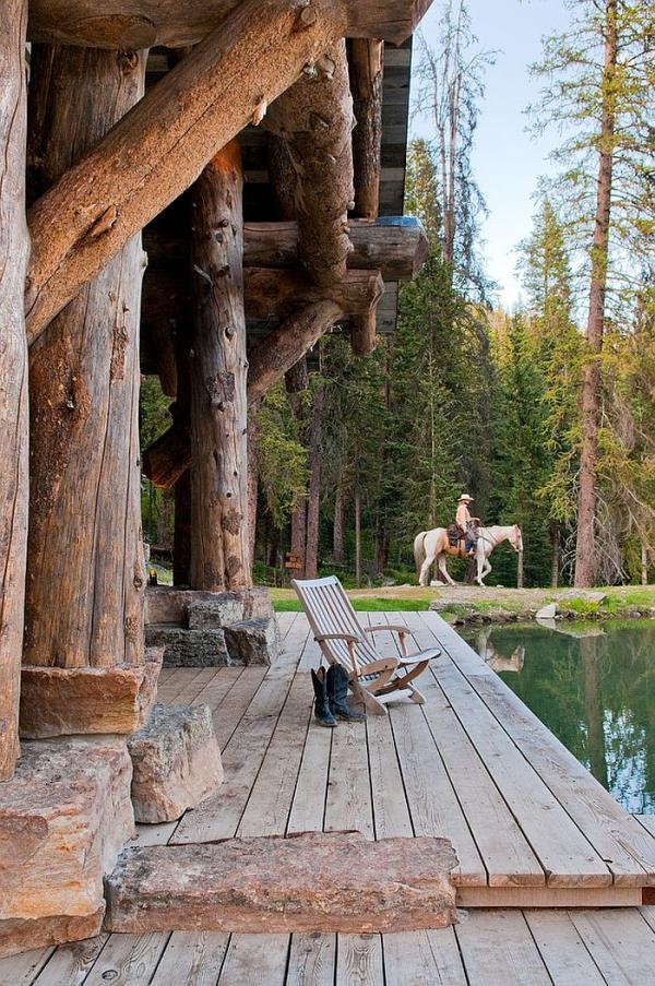 Relaxing-porch-of-the-Headwaters-camp-cabin-exudes-umatched-rustic-beauty