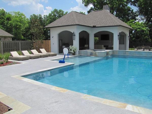 Salt-rock-texture-stamped-concrete-shapes-the-cool-pool-deck