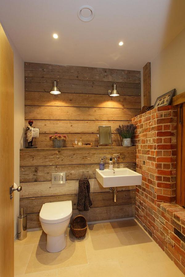 Small-bathroom-with-brick-wall-and-touch-of-wooden-warmth
