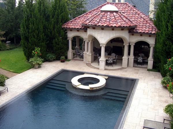 Stamped-concrete-pool-deck-is-both-aesthetic-and-durable