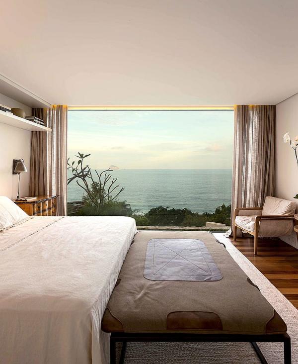 Stunning-bedroom-offers-amazing-view-of-the-ocean-in-the-distance