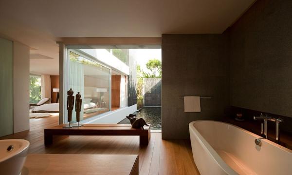 Stylish-bath-visually-connected-with-the-pond-outdoors