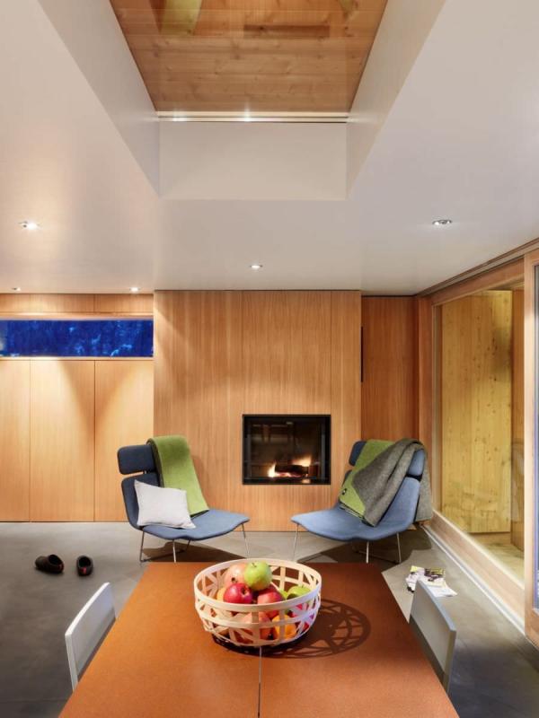 arsenal-b47-ralph-germann-architectes-dining-table-fireplace