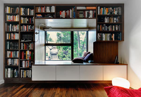 built-in-bookshelf-around-window-with-space-for-reading