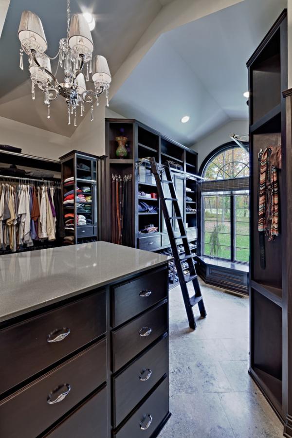 closet-room-with-ladder-for-upper-shelves