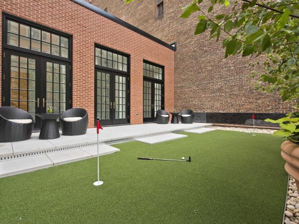 included-in-the-over-3000-square-feet-of-outdoor-space-is-a-croquet-pitch-and-a-putting-green