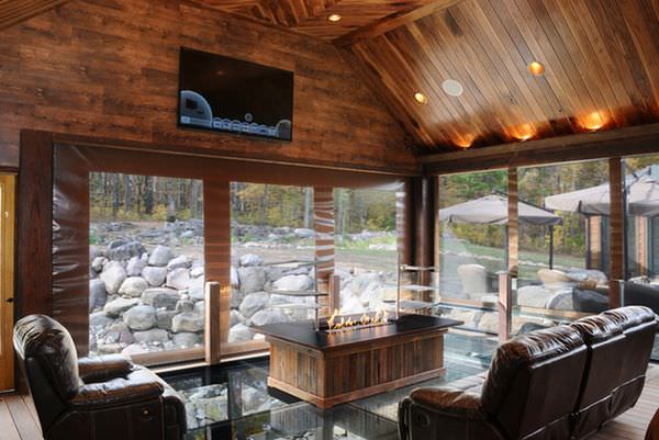 mountain-living-room-featuring-a-glass-floor-to-see-the-ground-or-river